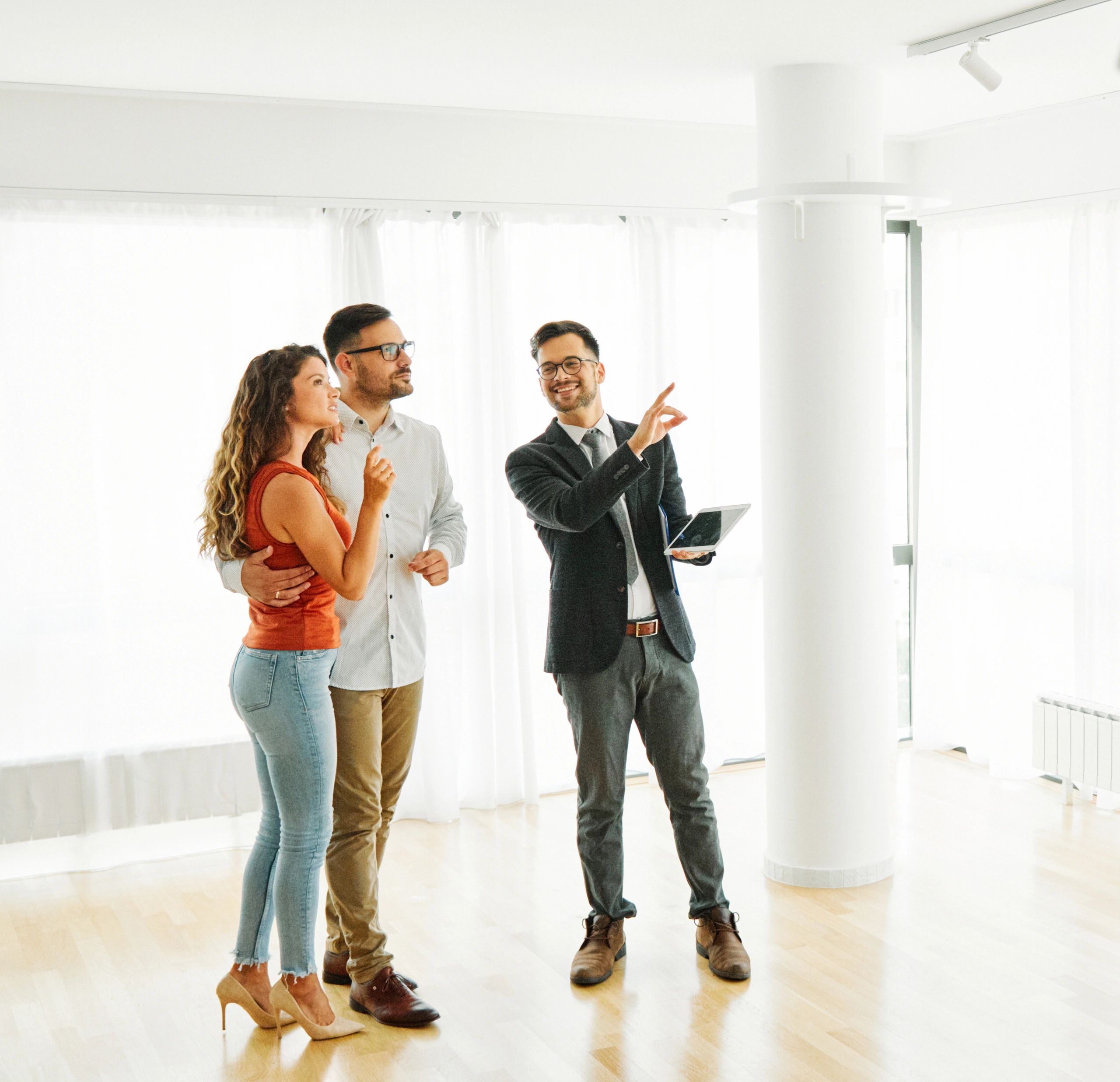 real estate agent showing house